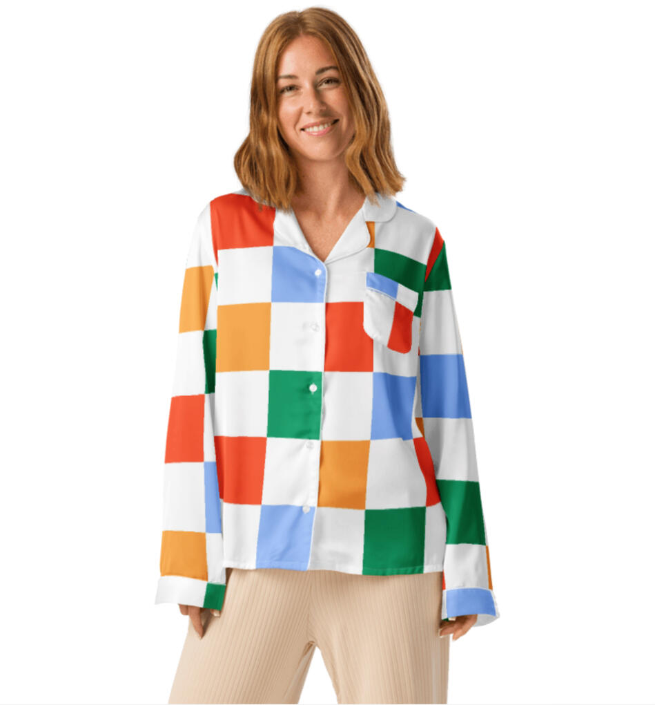 Retro checkerboard pattern in blue, green, orange and red on a soft button up pajama shirt. Retro checkerboard pattern in blue, green, orange and red on a soft button up pajama shirt.